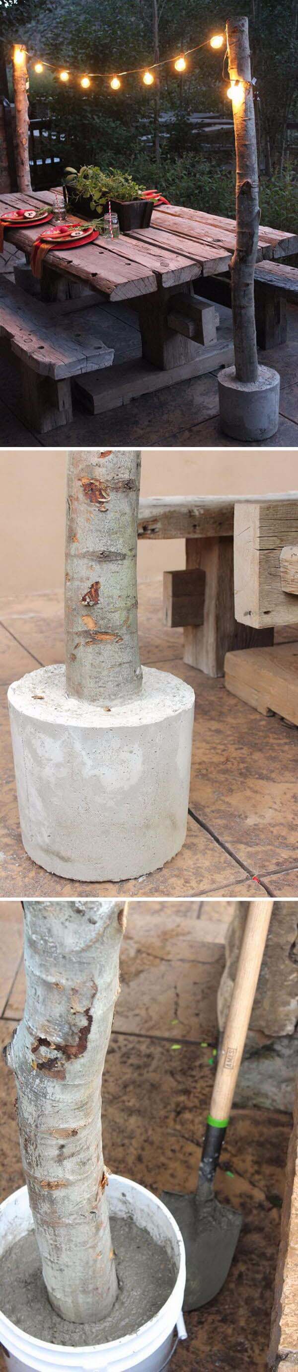 DIY String Light Poles With Concrete Bases #diy #concrete #backyard #decorhomeideas