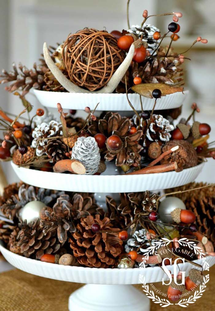 Rustic Tiered Display With Backyard Finds And Frosted Pinecones #Christmas #cakestand #decorhomeideas