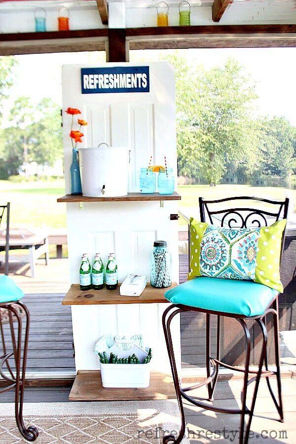 Repurposed Door makes a Beverage Station #olddooroutdoordecor #olddoorgarden #decorhomeideas