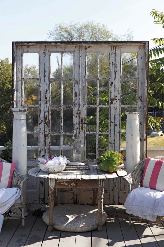 Weathered French Doors as a Backdrop #olddooroutdoordecor #olddoorgarden #decorhomeideas