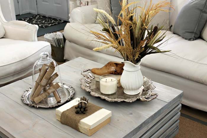 Earth-toned Brown and White Natural Element Display with Silver Accents #coffeetabledecor #decorhomeideas