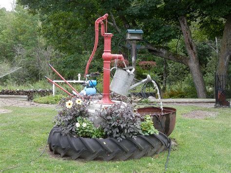 Old Red Pump Incorporate With Unuse Tire