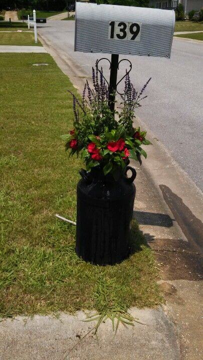 Recycled An Old Milk Can Into A Mailbox Post