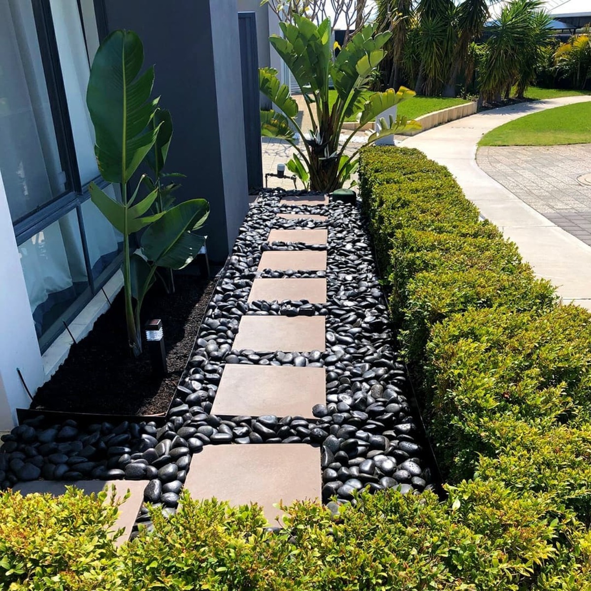 creative ways to use black rocks in landscaping 8